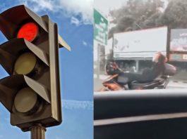 Pemuda baring atas motosikal kerana tunggu lampu isyarat terlalu lama