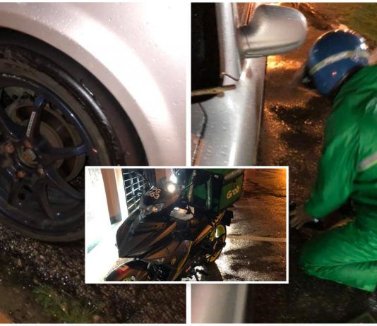 Rider GrabFood baik hati tolong tukar tayar walaupun cuaca hujan