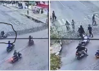 Akibat tidak fokus, penunggang motosikal ini ‘terlekat’ pada kawat berduri