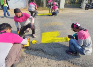 20 rider FoodPanda buat kerja amal, cat semula 50 bonggol jalan pudar