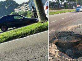 Proton Wira masuk lubang gara-gara tanah mendap