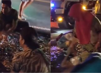 Orang ramai serbu mengutip duit syiling lebih RM20k, jatuh berteraburan atas jalan