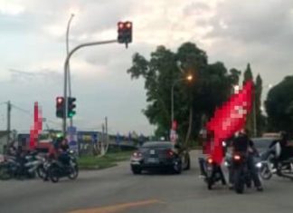 Polis cari rider bawa bendera parti berlagak marsyal