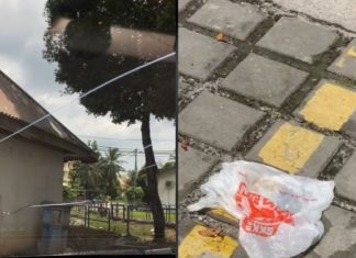 Cermin kereta pecah, buang ais batu dari atas bangunan