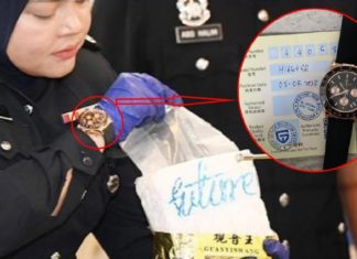 Polis wanita didakwa pakai jam tangan mewah, rupanya harga RM570