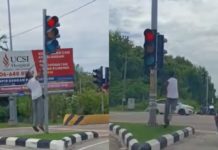 Lelaki ini ditahan kerana rosakkan lampu isyarat