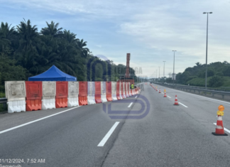 LEKAS tutup lorong kecemasan, perlahan di KM9.3 susulan runtuhan cerun