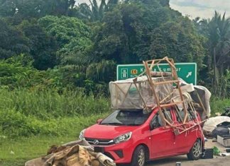 Polis tahan Perodua Axia angkut barang macam lori