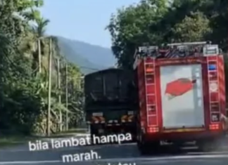 Polis saman pemandu lori halang laluan jentera bomba