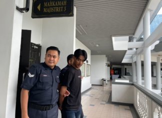 Cucu didakwa curi kad ATM datuk, beli alat ganti motosikal