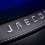 8. JAECOO logo badge front studio close up on E5