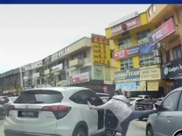 Polis kesan lelaki rosak cermin sisi kereta